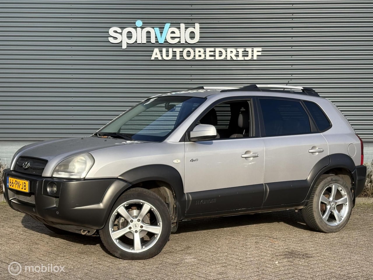 Hyundai Tucson - 2.7i V6 4WD Style - Automaat - Climate - Nap - - AutoWereld.nl