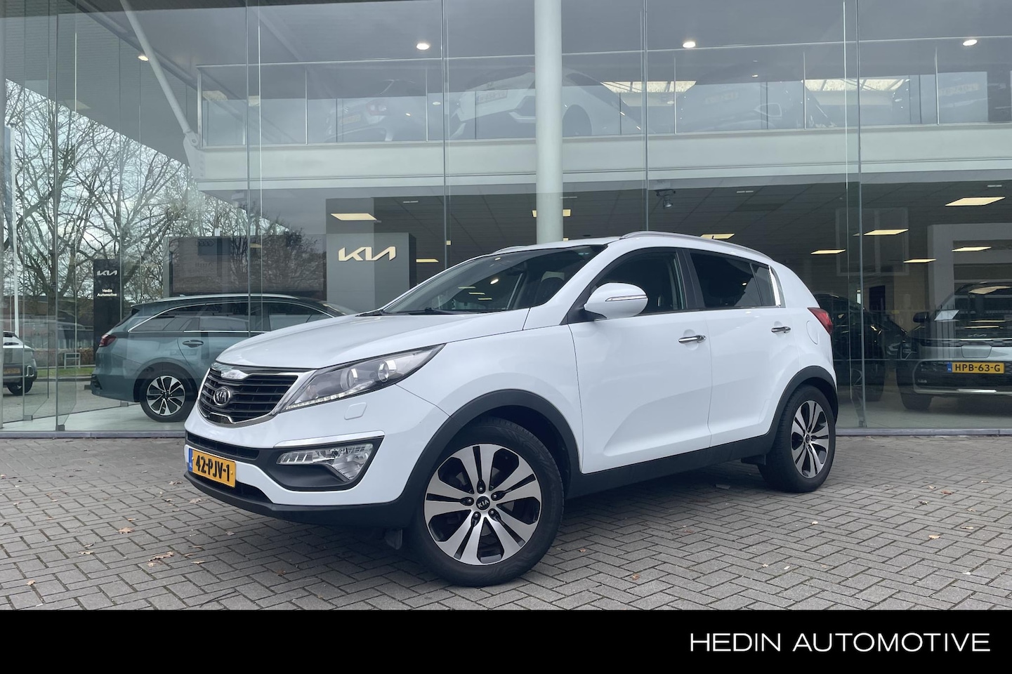 Kia Sportage - 2.0 X-clusive | 1e eig. | Nav | Camera | Leder | - AutoWereld.nl
