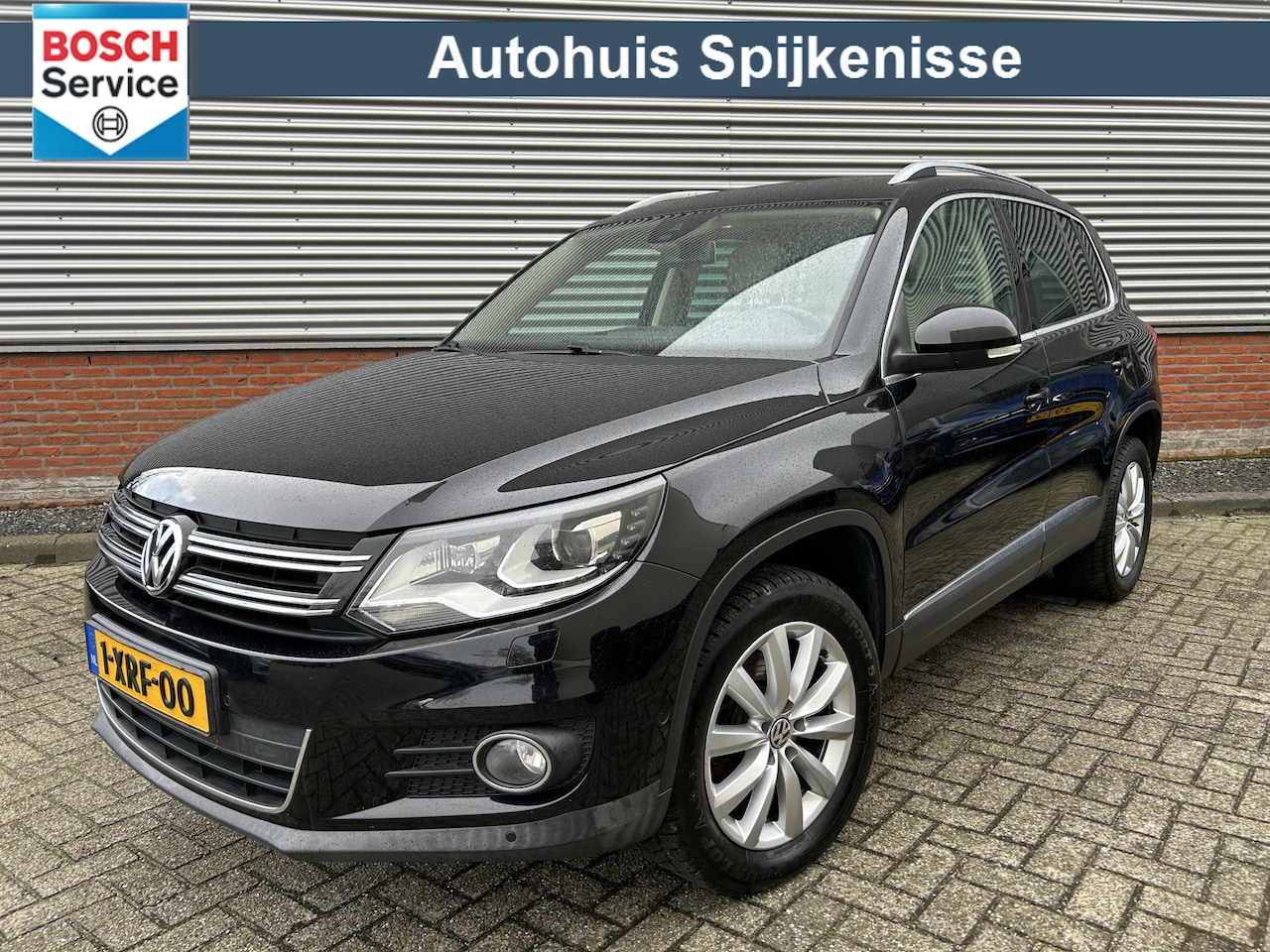Volkswagen Tiguan - 2.0 TSI Sport&Style 4motion | Automaat | Stoelverwarming | Stuurverwarming | Leder | Camer - AutoWereld.nl