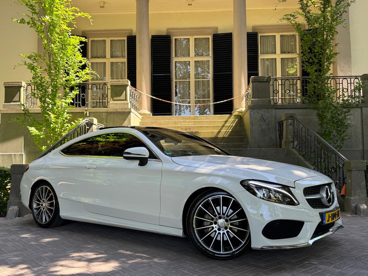 Mercedes-Benz C-klasse Coupé - 180 AMG Line Panoramadak Navi Camera Xenon Leder Climate Cruise Ctr Full Options - AutoWereld.nl