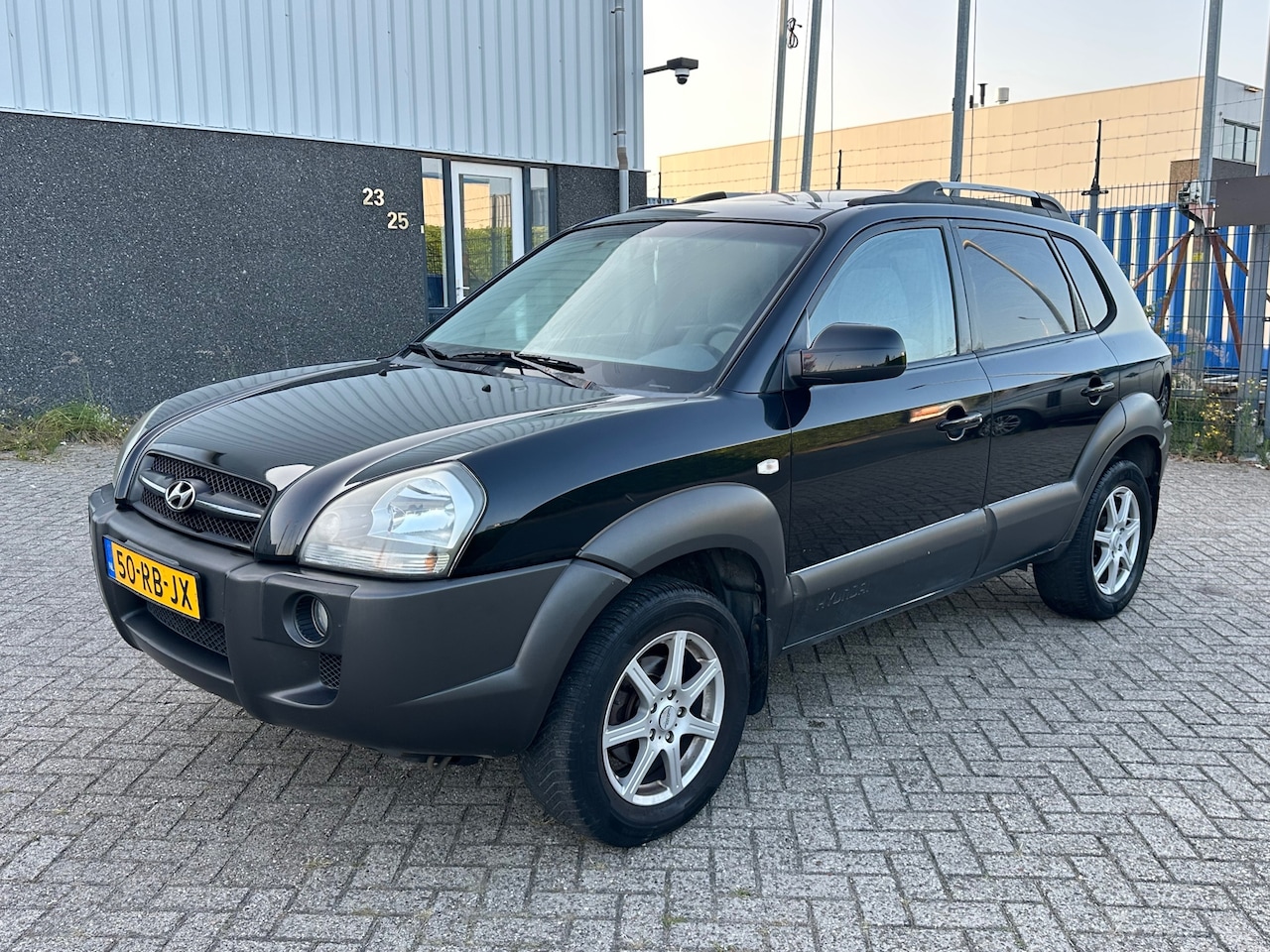 Hyundai Tucson - 2.0i Dynamic 2005 Zwart Schuifdak Airco - AutoWereld.nl