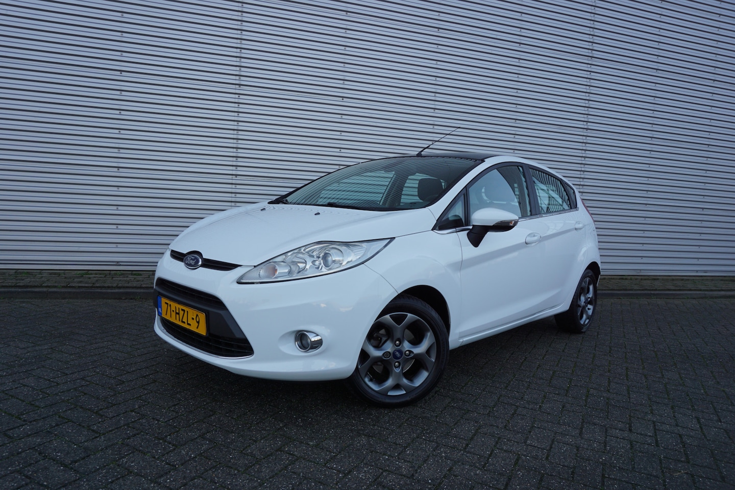 Ford Fiesta - 1.25 Titanium Climate / Cruise / Elektr. ramen / Parkeersens. / Lm velgen / NAP - AutoWereld.nl