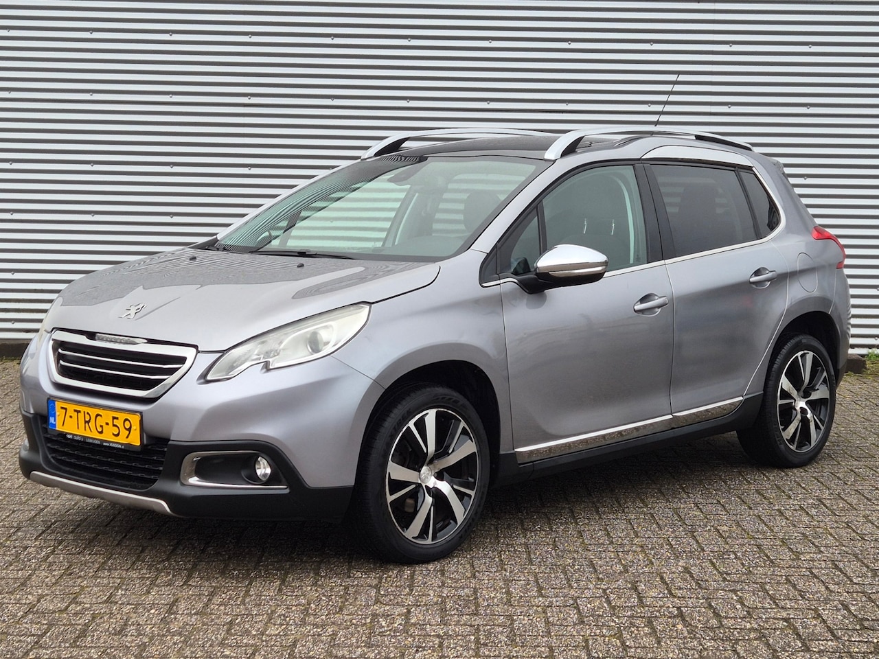Peugeot 2008 - 1.6 VTi Féline Pano Leder Navi - AutoWereld.nl