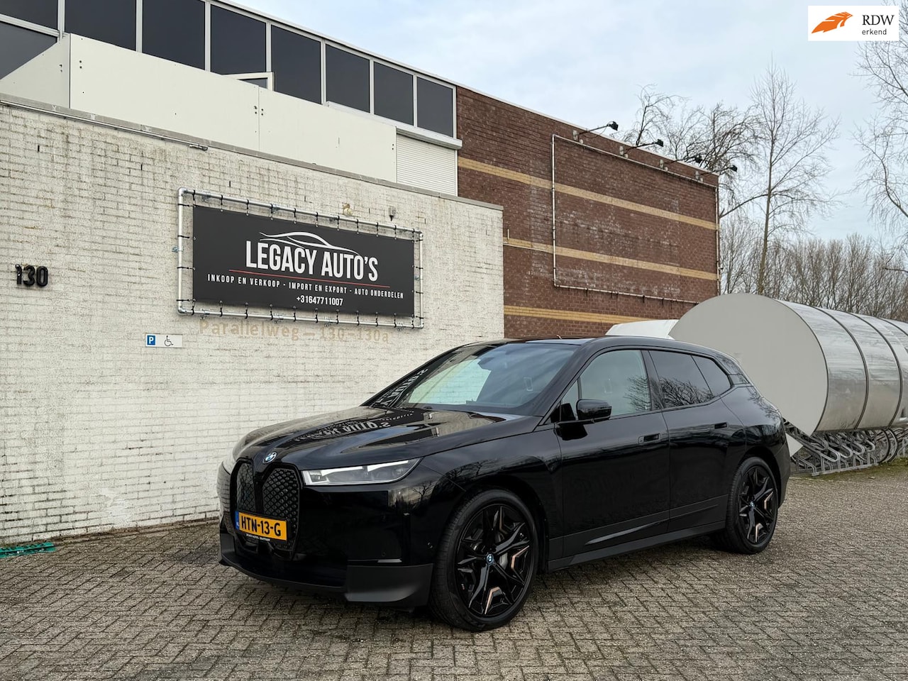 BMW iX - XDrive50 High Executive 112 kWh -ZEER LAGE KM - PANO - HARMAN KARDON - H/U DISPLAY - VOL O - AutoWereld.nl