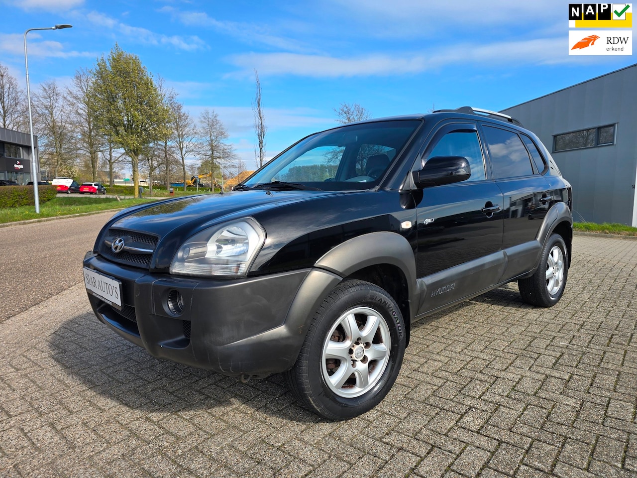 Hyundai Tucson - 2.0i 4WD 4x4 Style Nieuw A.P.K nette auto - AutoWereld.nl