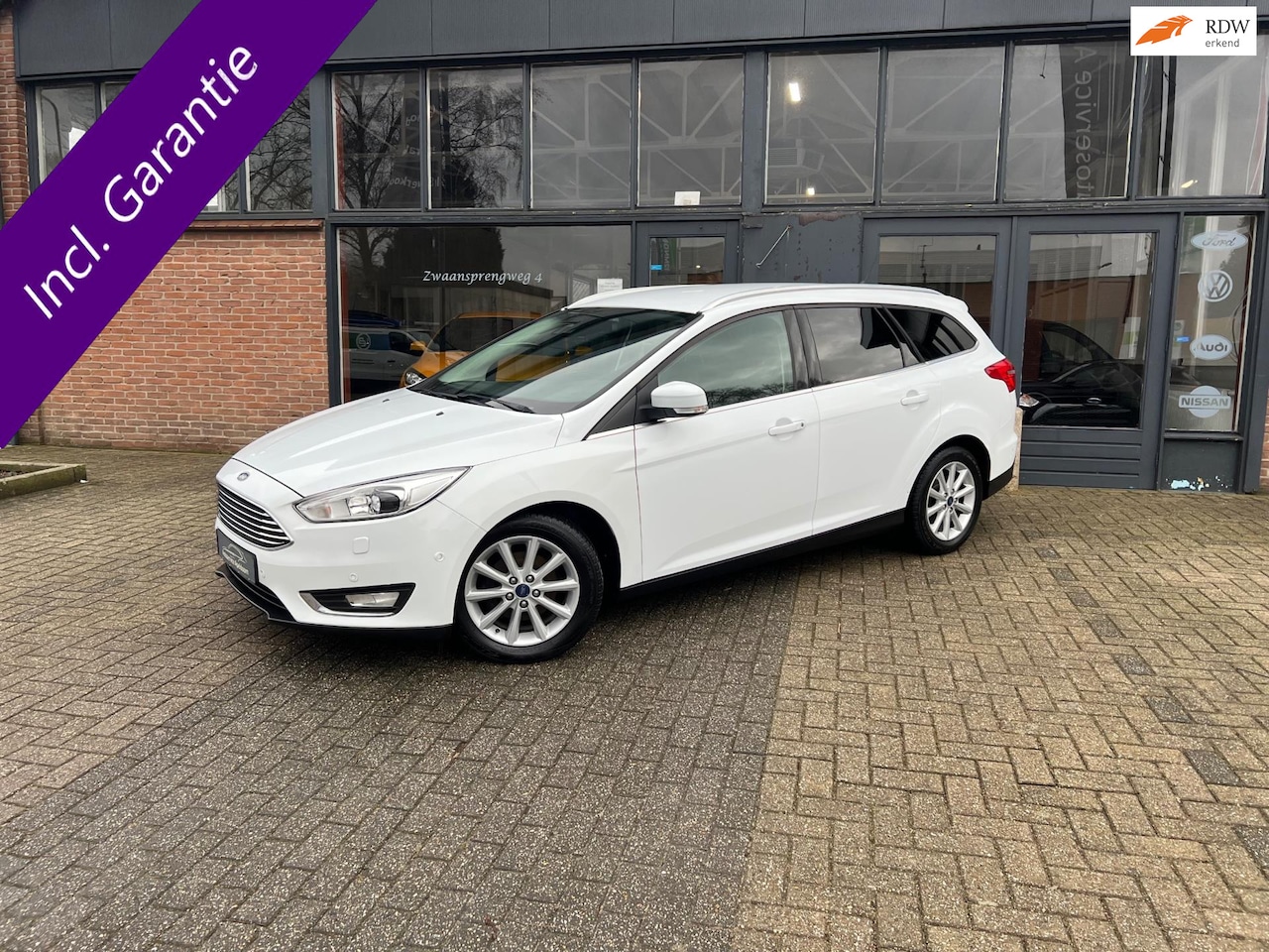Ford Focus Wagon - 1.0 Titanium 1.0 Titanium, Cruise control, Navi, Leder, Camera - AutoWereld.nl