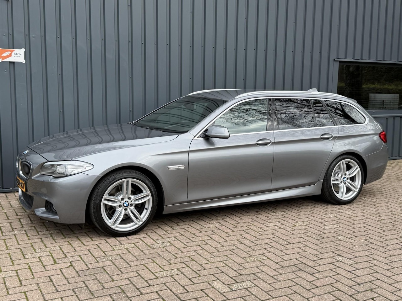 BMW 5-serie Touring - 520i High Executive M-PAKKET!/NAP!/NAVI!/ - AutoWereld.nl