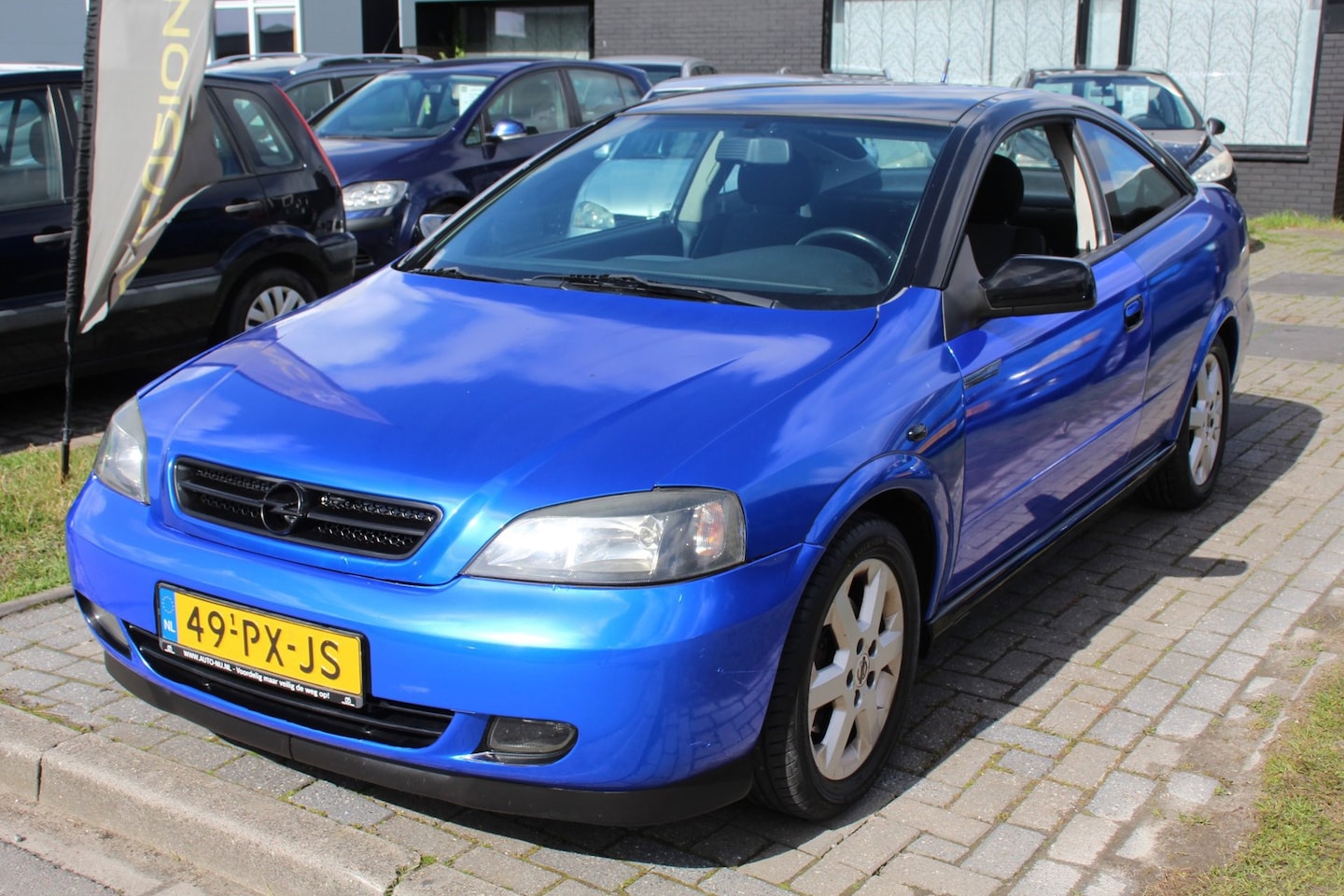 Opel Astra Coupé - 1.8-16V Bertone Coupé Wrapped Airco LM-Velgen Ned auto! Elec pakket NAP APK - AutoWereld.nl