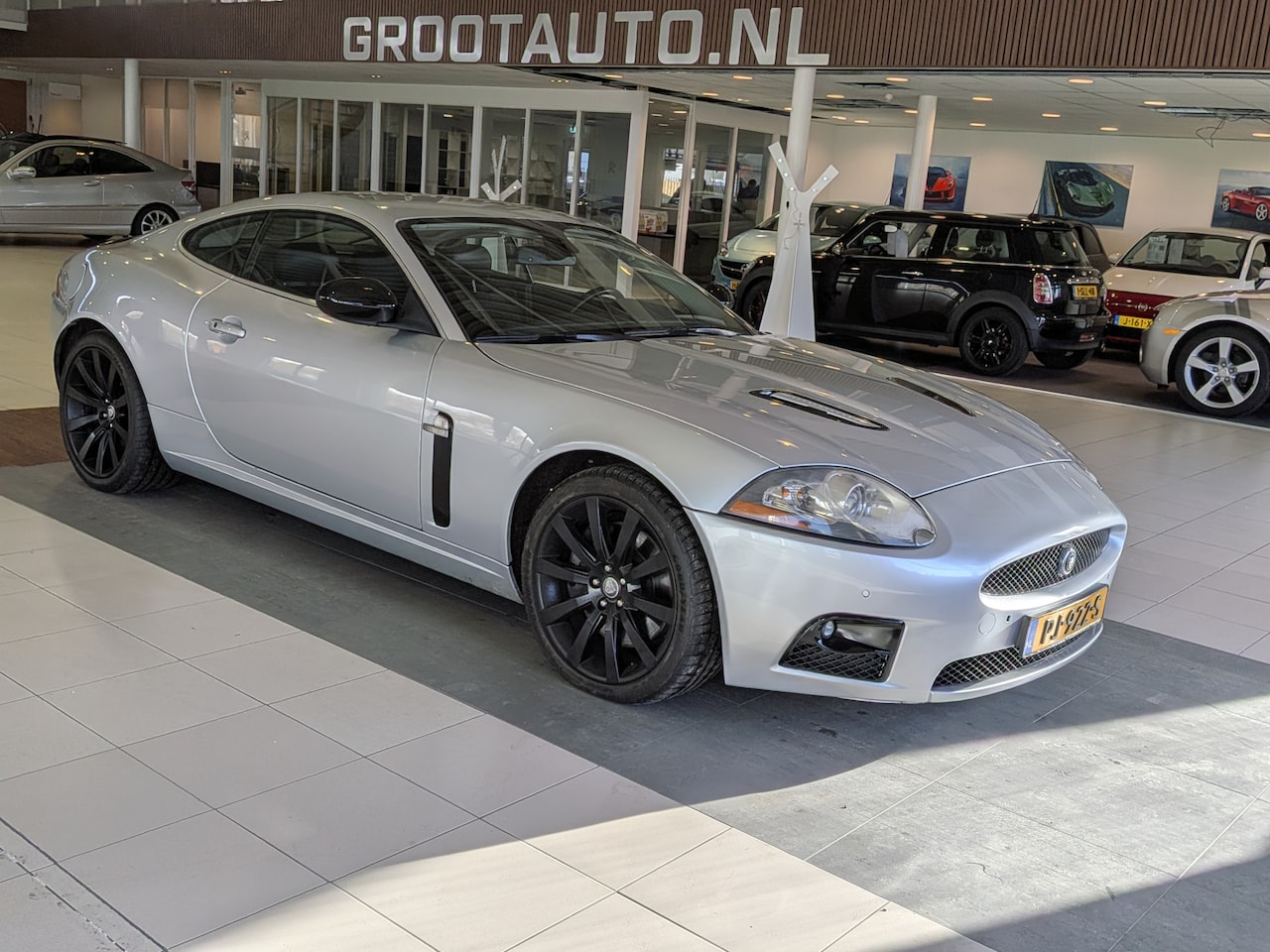 Jaguar XKR - 4.2 V8 Coupé Automaat Supercharged 417PK Youngtimer, Airco, Cruise control, Stoelverwarmin - AutoWereld.nl