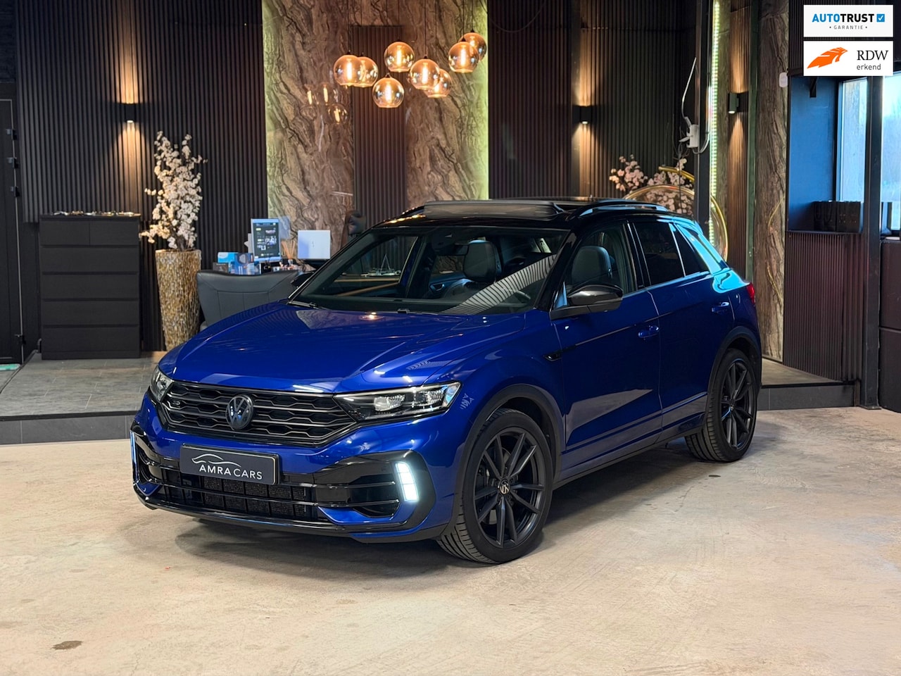 Volkswagen T-Roc - 2.0 TSI 4Motion R|PANO|AKRA|LEDER|FULL OPTIONS - AutoWereld.nl