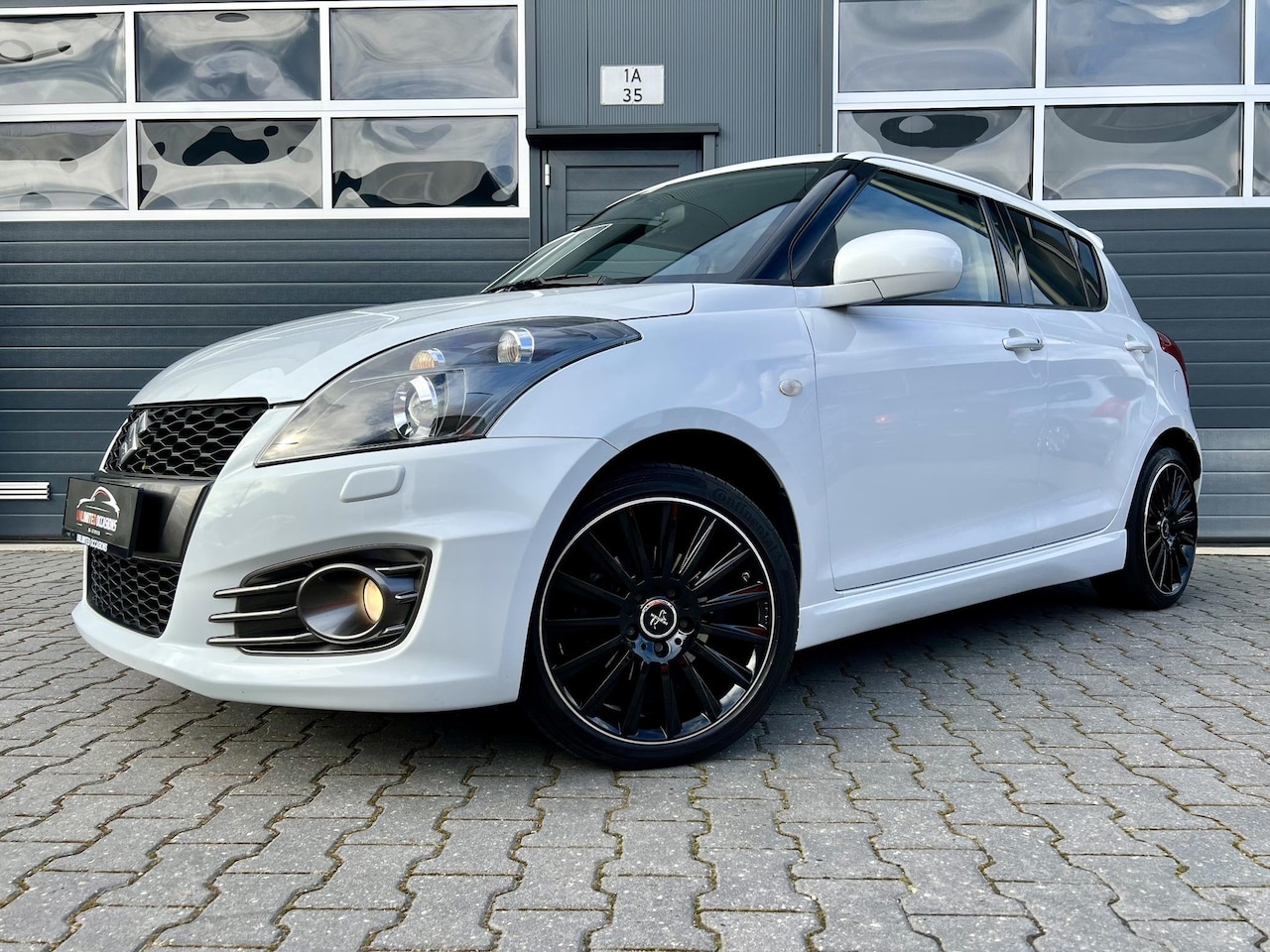 Suzuki Swift - 1.6 Sport *PARLEMOER*KESKIN*CRUISE*XENON*KEYLESS - AutoWereld.nl