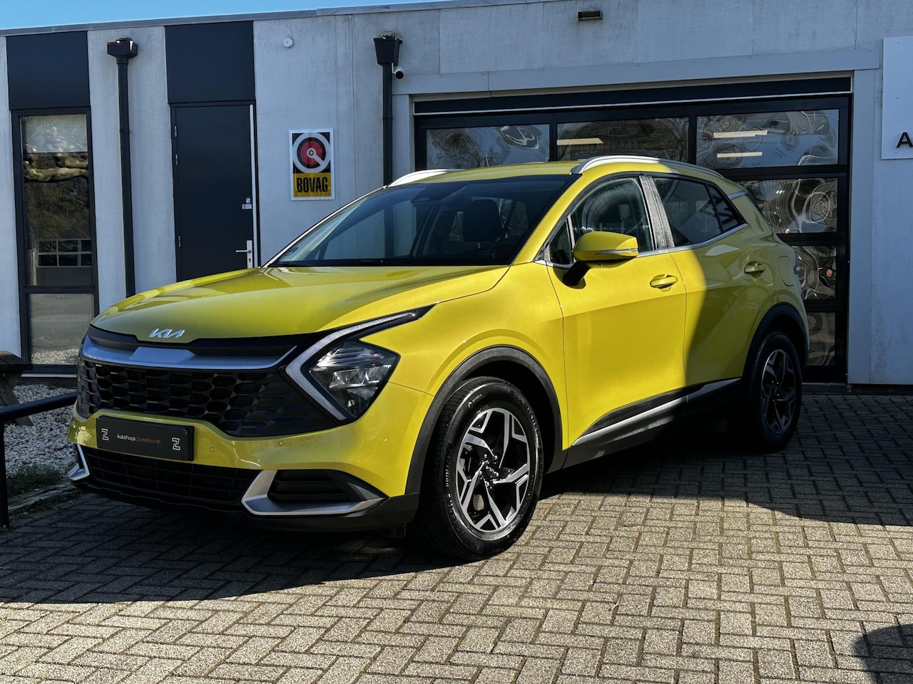 Kia Sportage - 1.6 T-GDi MHEV ComfortLine Carplay & Camera | Stoel-/Stuurverwarming | Splash Lemon - AutoWereld.nl