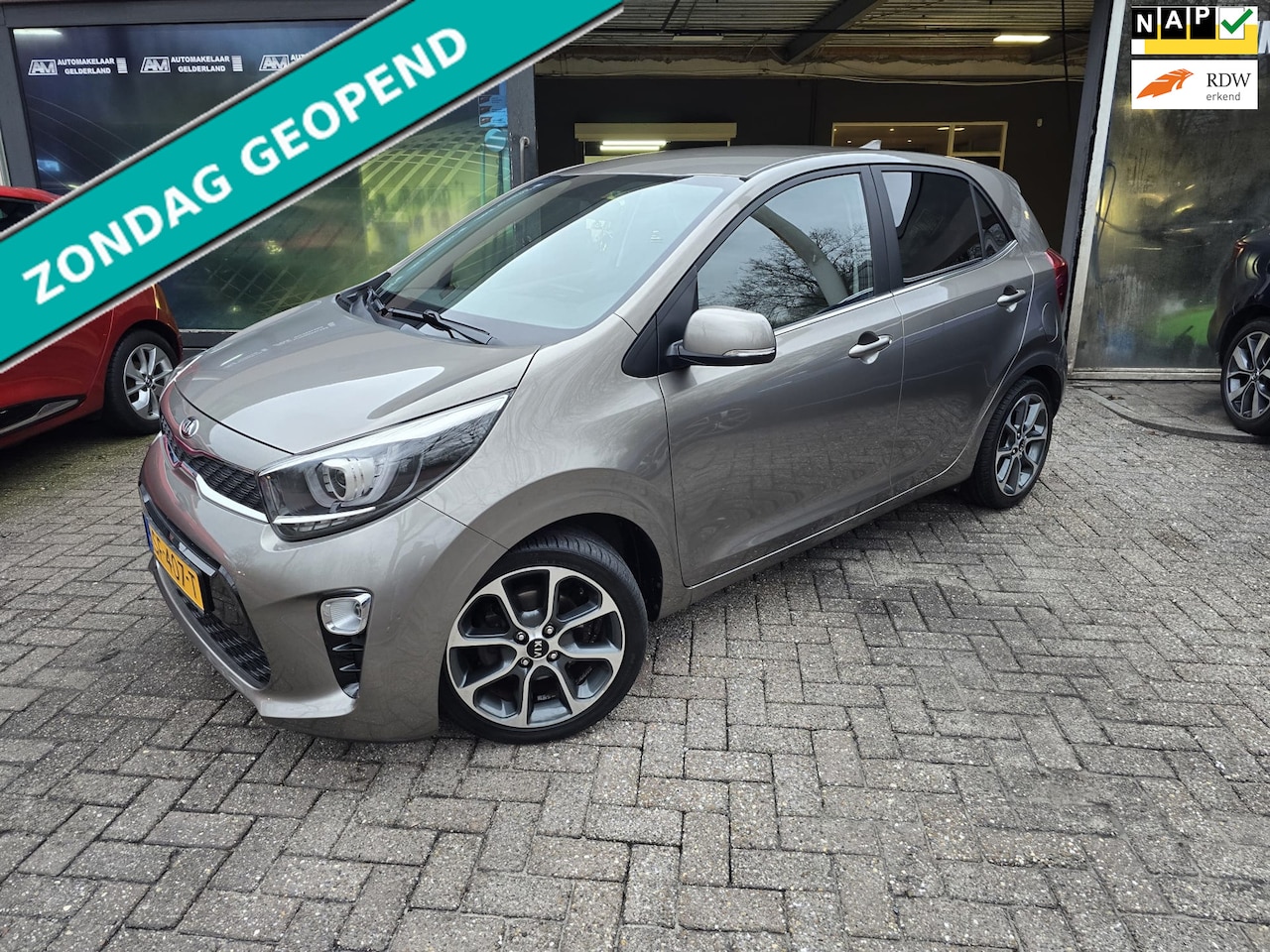 Kia Picanto - 1.0 CVVT Design Edition | 1E EIGENAAR | 12MND GARANTIE | NAVI | CAMERA | CRUISE | - AutoWereld.nl