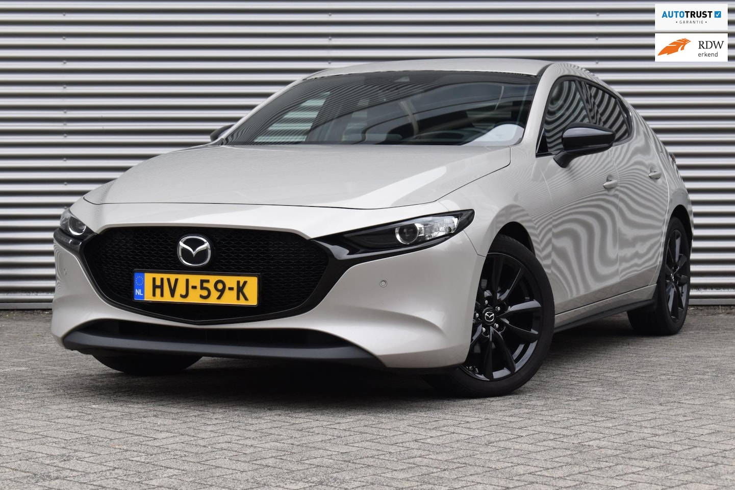 Mazda 3 - 2.0 e-SkyActiv-G M Hybrid HOMURA, Ecc, Camera, Xenon. - AutoWereld.nl