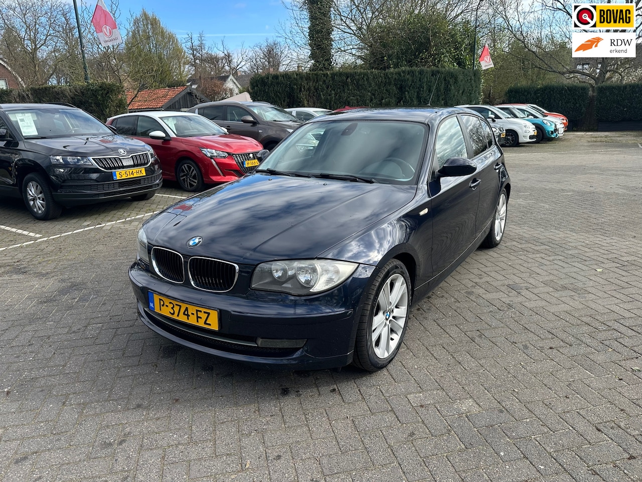 BMW 1-serie - 118i Business Line 182.000 km - AutoWereld.nl