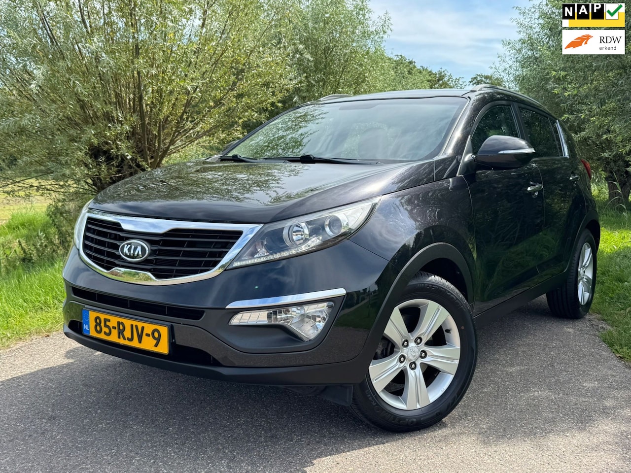 Kia Sportage - 1.6 GDI X-ecutive Plus Pack / Airco / Navigatie / Camera / CC / PDC / Half Leder / LMV 17" - AutoWereld.nl
