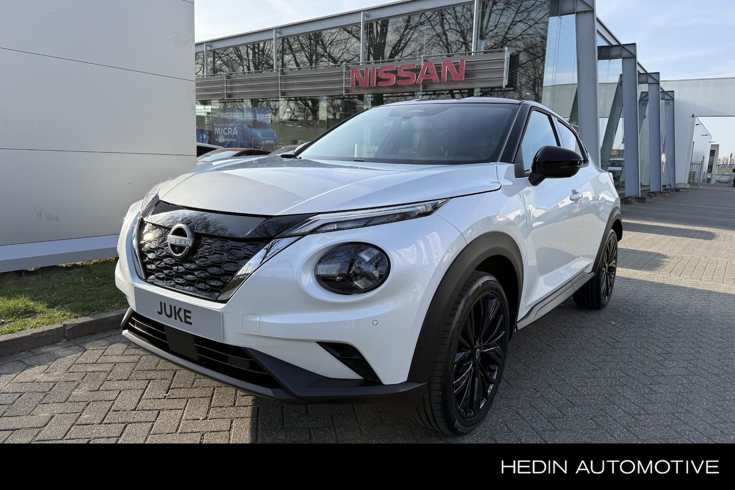 Nissan Juke - 1.6 Hybrid Red-Line Edition | NIEUW | Nav., Adapt. Cruise, BOSE, Rondomzicht Camera, Draad - AutoWereld.nl