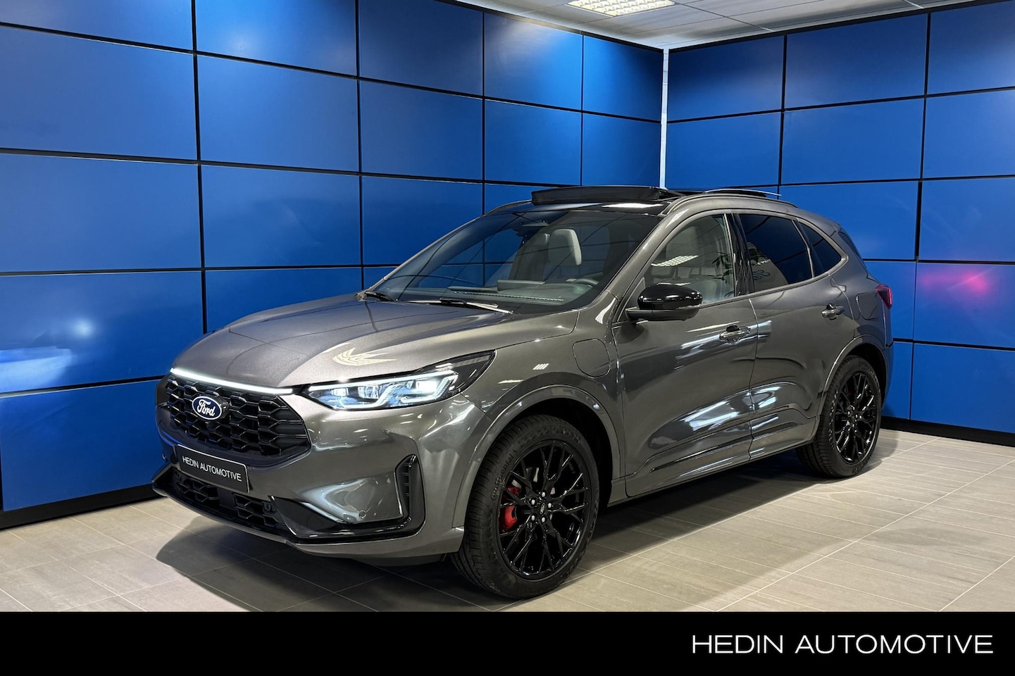 Ford Kuga - 2.5 PHEV Sound Edition Black pack Magnetic grey/panorama dak/20 inch lichtmetalen velgen - AutoWereld.nl
