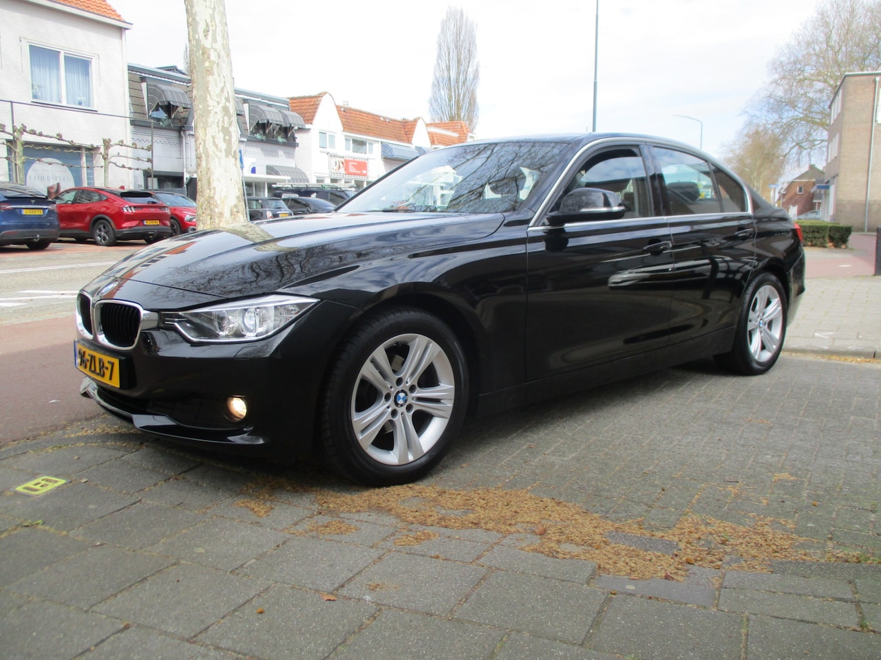 BMW 3-serie - 320i EfficientDynamics Edition Upgrade Edition / AIRCO / LEER / NAVI / NL.AUTO / NW-STAAT - AutoWereld.nl