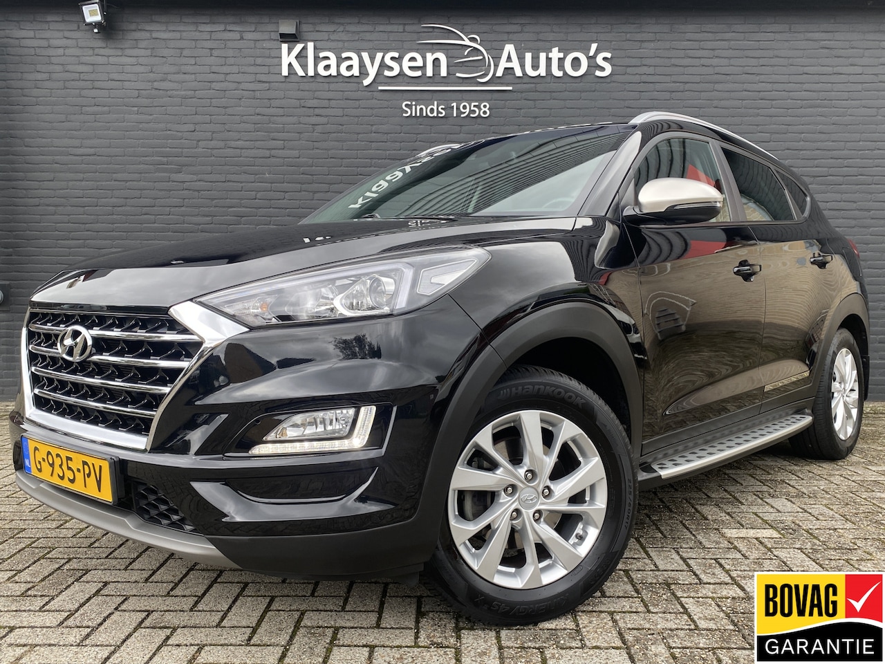 Hyundai Tucson - 1.6 T-GDI Comfort 177 pk AUT. | dealer onderhouden | navigatie | trekhaak | camera | stoel - AutoWereld.nl