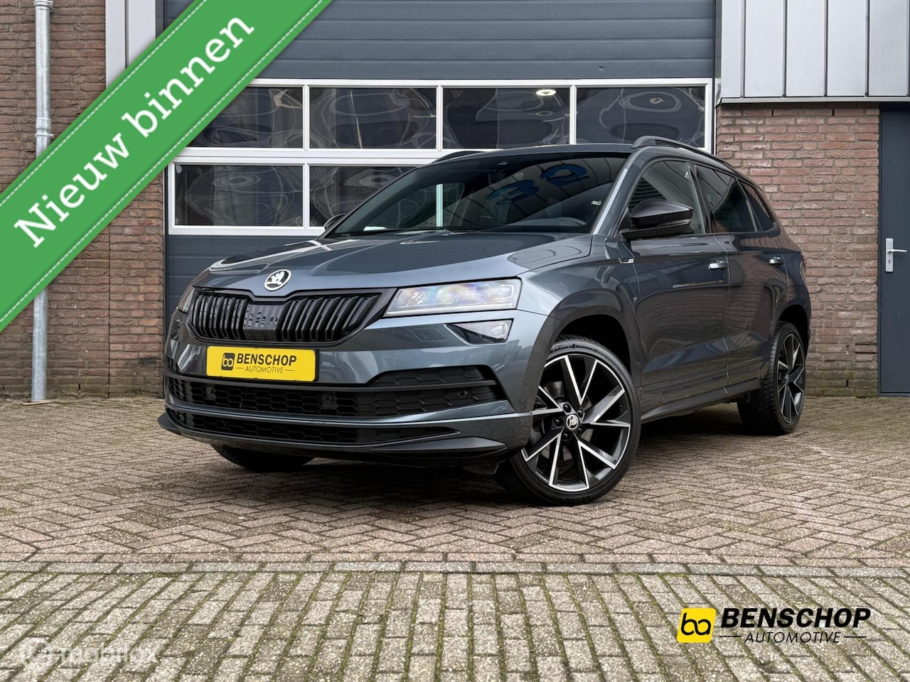 Skoda Karoq - 1.5 TSI ACT Sportline Virtual Bucket Seats Navi Carplay ACC Camera - AutoWereld.nl