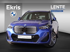 BMW iX1 - eDrive20 | M Sportpakket Pro | Panorama Dak | Stoelverwarming | Achteruitrijcamera | Lente