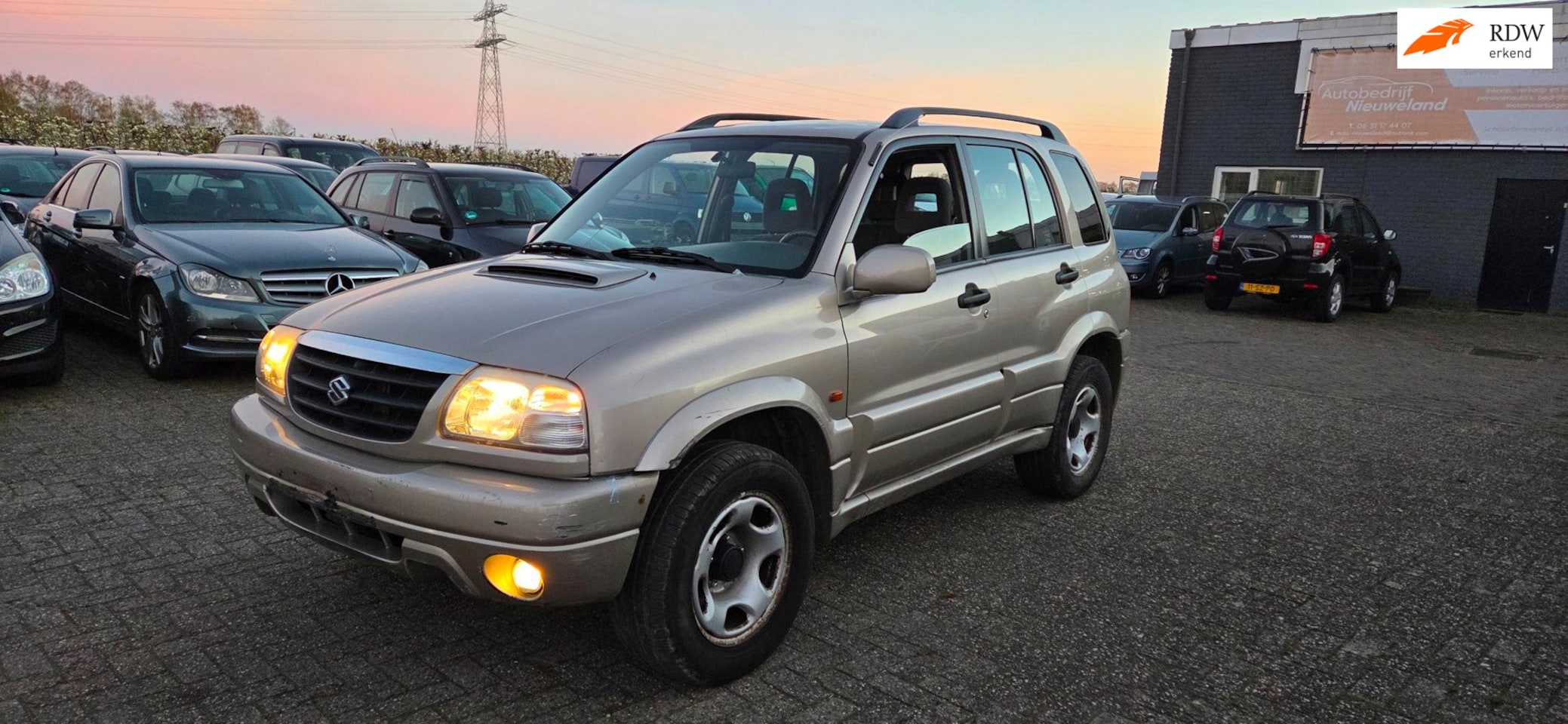 Suzuki Grand Vitara - 2.0 Turbo Diesel Airco 4x4 - AutoWereld.nl