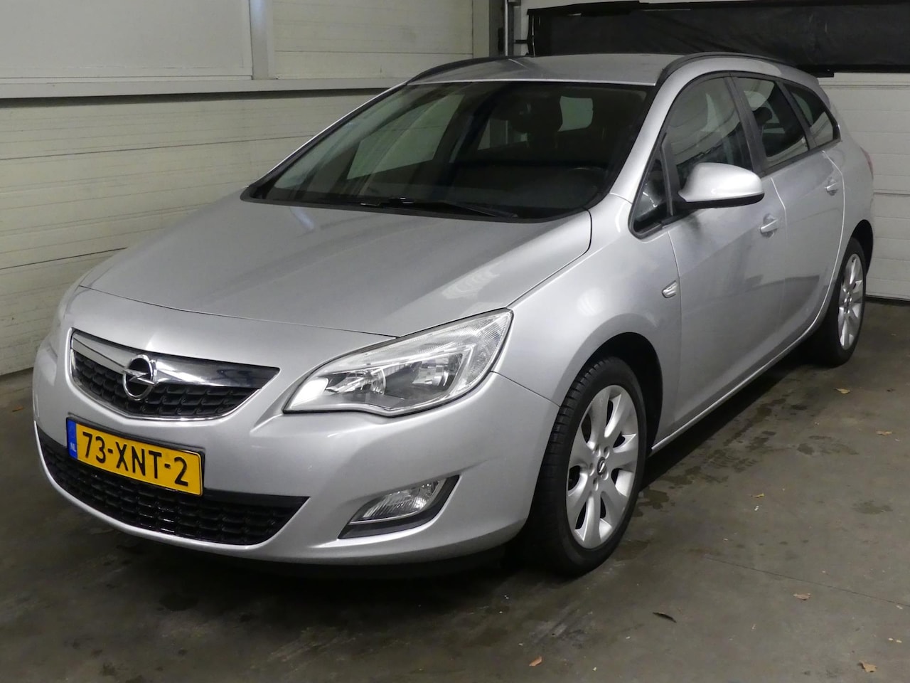 Opel Astra Sports Tourer - 1.4 Cosmo - Navigatie - AutoWereld.nl