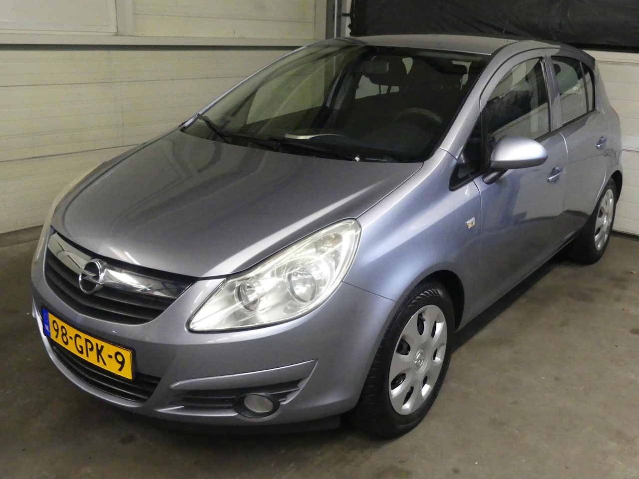 Opel Corsa - 1.2-16V Enjoy - 1e eigenaar - Airco - 5deurs - AutoWereld.nl