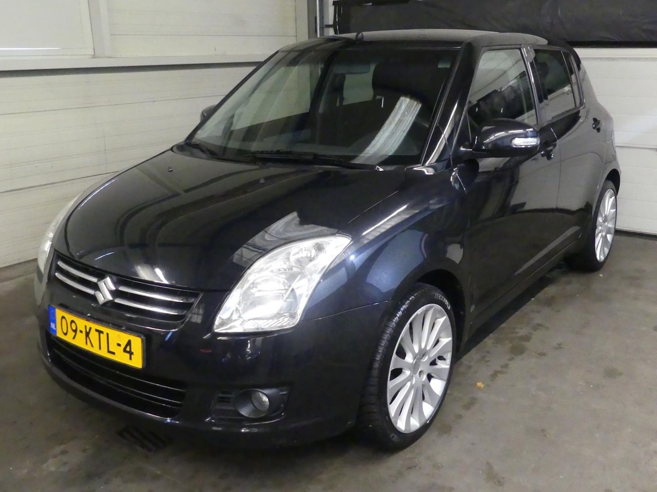 Suzuki Swift - 1.3 Limited - 5Deurs - Airco - Alcantara Leer - AutoWereld.nl