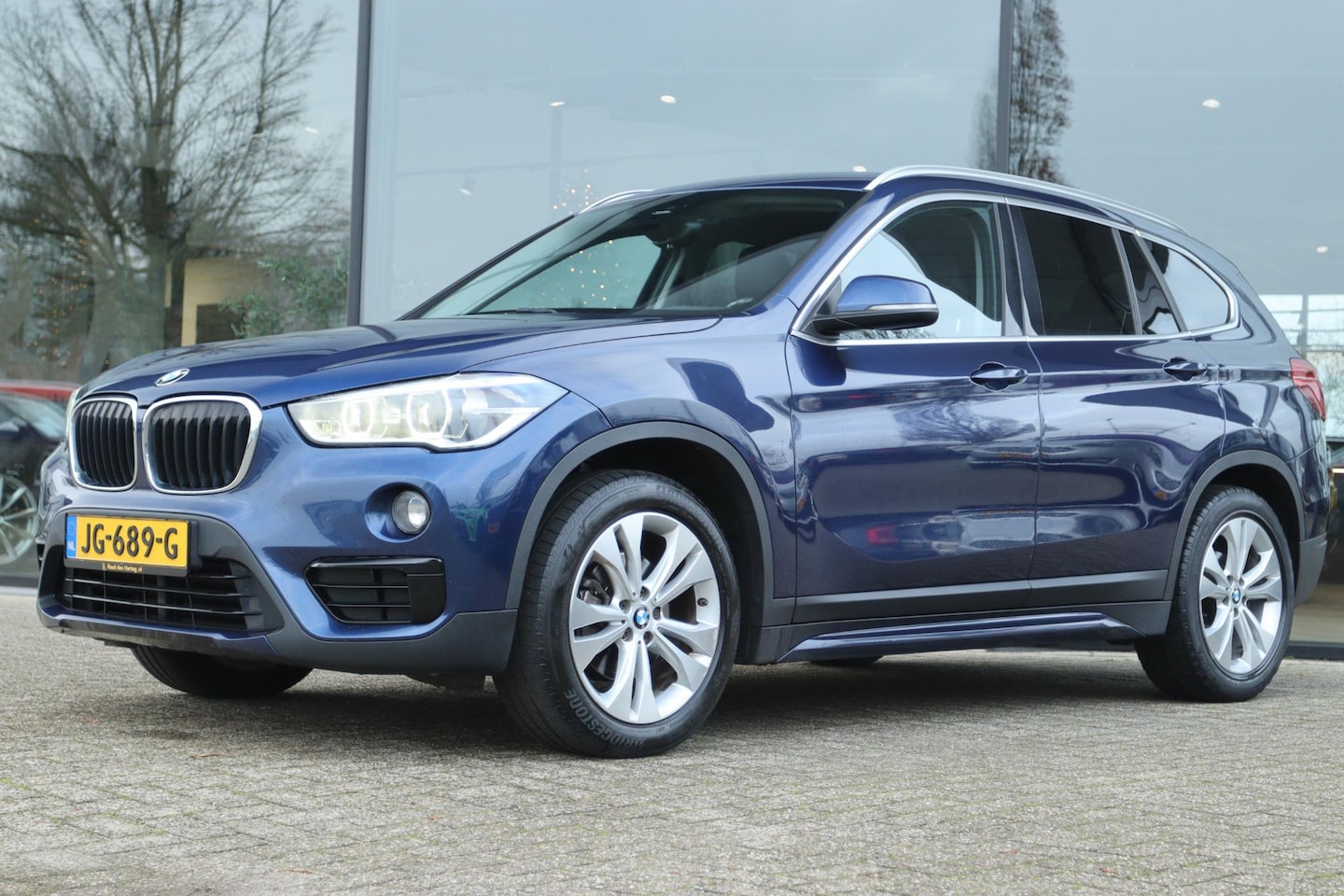 BMW X1 - SDRIVE16D CORPORATE LEASE SPORT | LED | LEDER | HUD | NAVI | CRUISE | CLIMATE - AutoWereld.nl