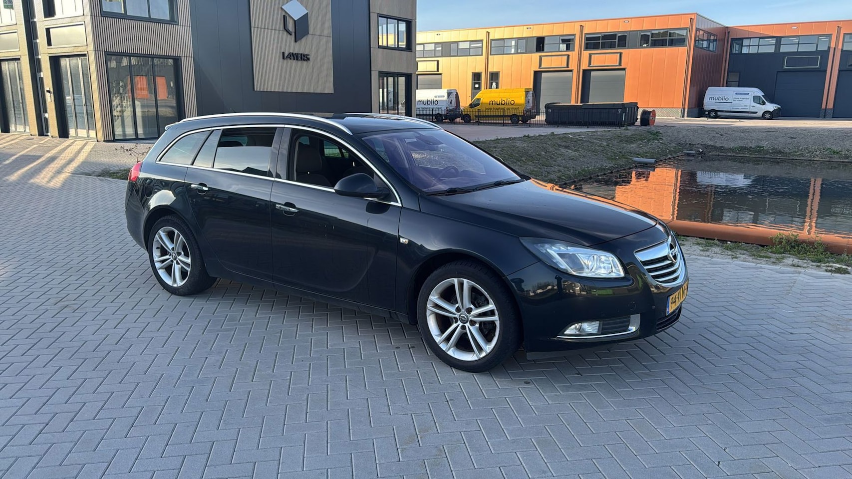 Opel Insignia Sports Tourer - 2.0 CDTI Cosmo Automaat Leer Zwart 2010 - AutoWereld.nl