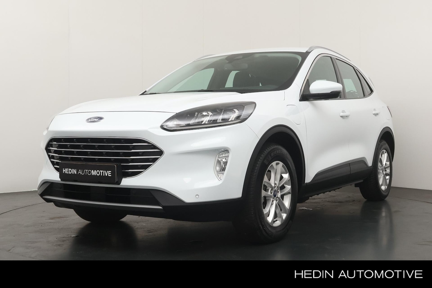 Ford Kuga - 2.5 225PK PHEV Titanium Automaat | Stoel+Stuur Verwarming | Achteruitrijcamera | Navigatie - AutoWereld.nl