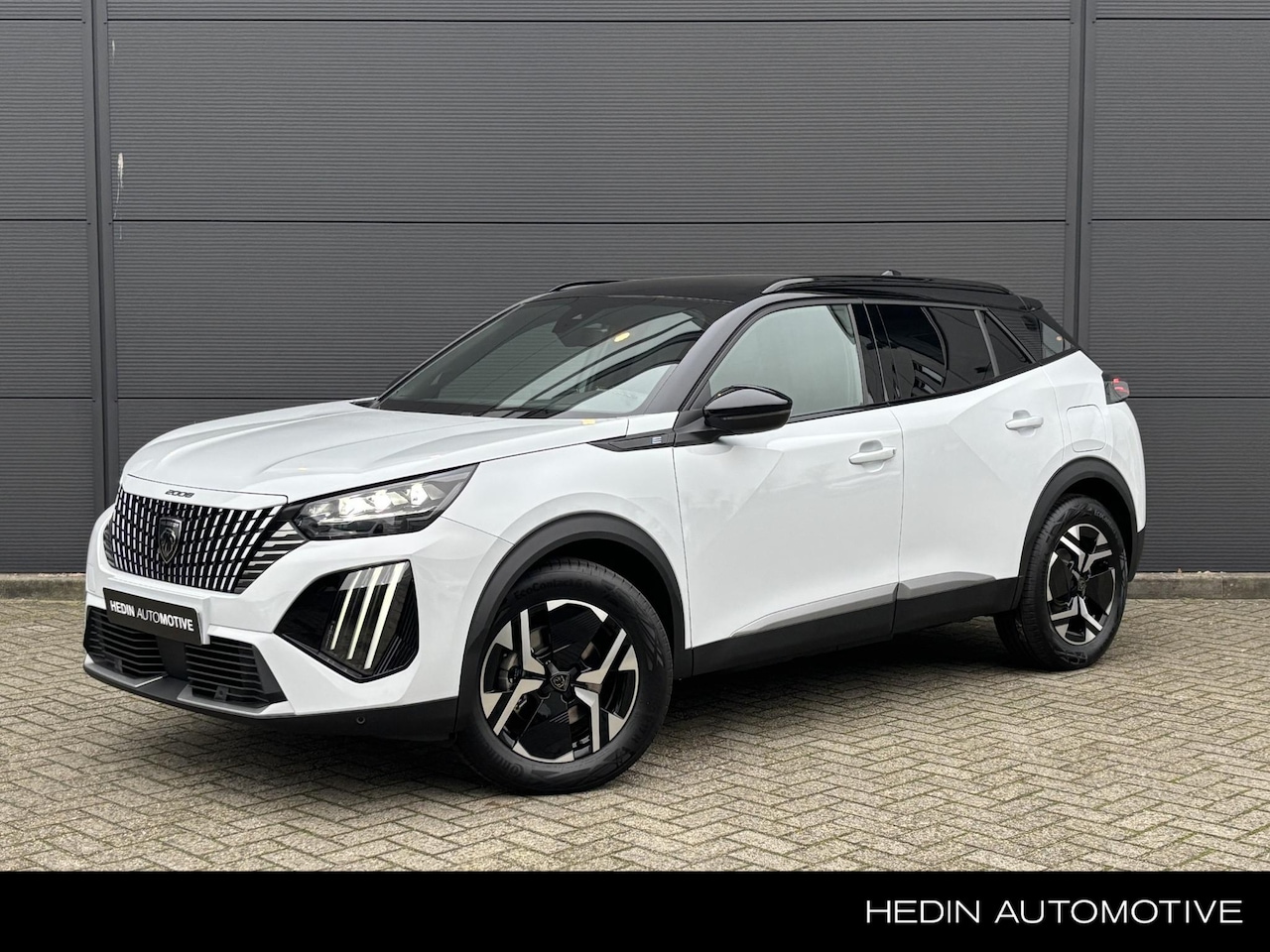 Peugeot e-2008 - EV GT 54 kWh | Warmtepomp | Full Map Navigatie | Draadloze telefoonlader | Keyless Entry | - AutoWereld.nl