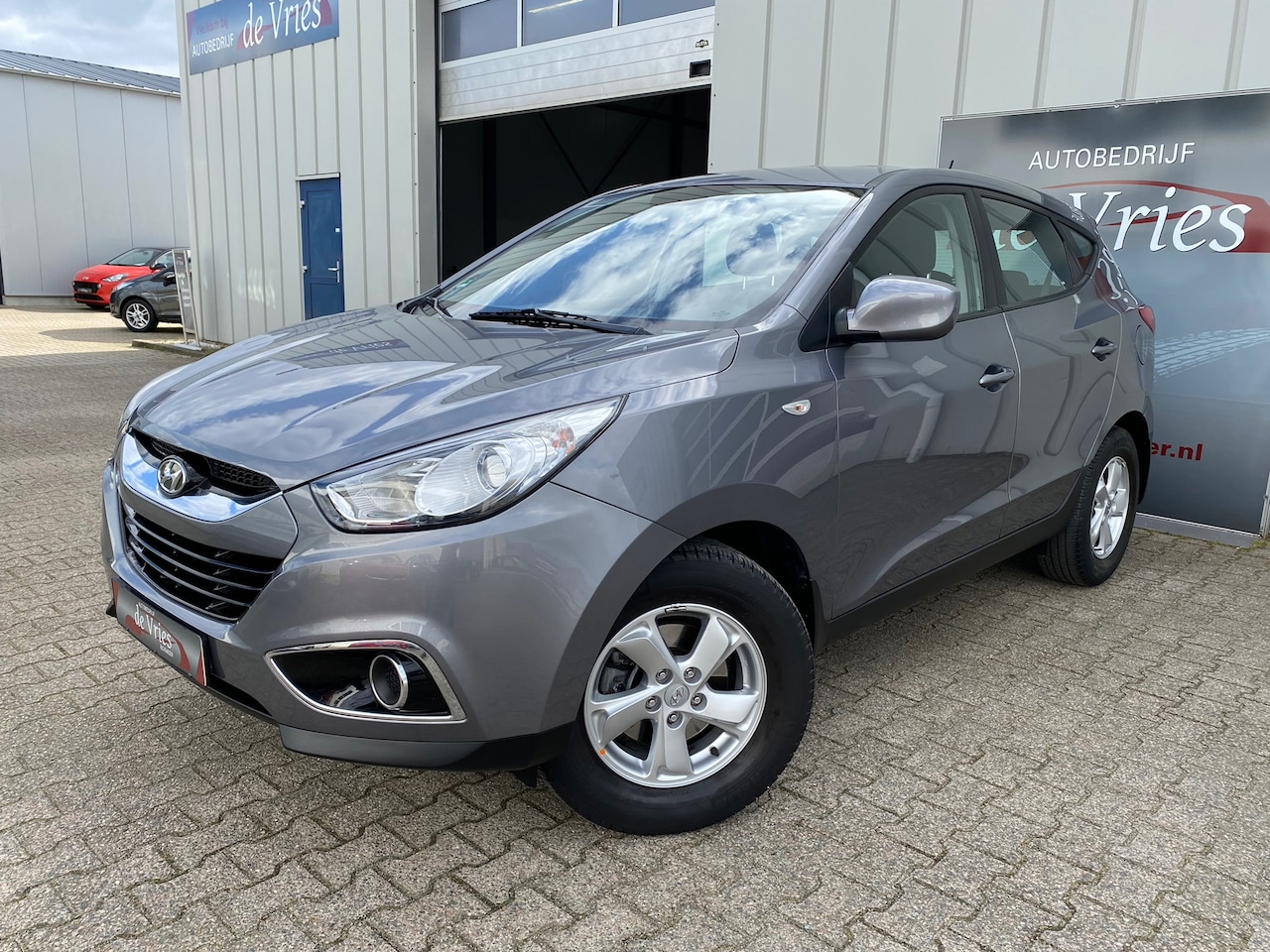Hyundai ix35 - 2.0i Active Automaat / Airco / Trekhaak / LMV - AutoWereld.nl