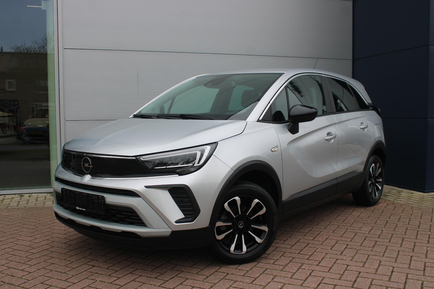 Opel Crossland - 1.2 Turbo 110pk Business Elegance Airco Navi Camera Carplay 16.385km Nieuwstaat - AutoWereld.nl