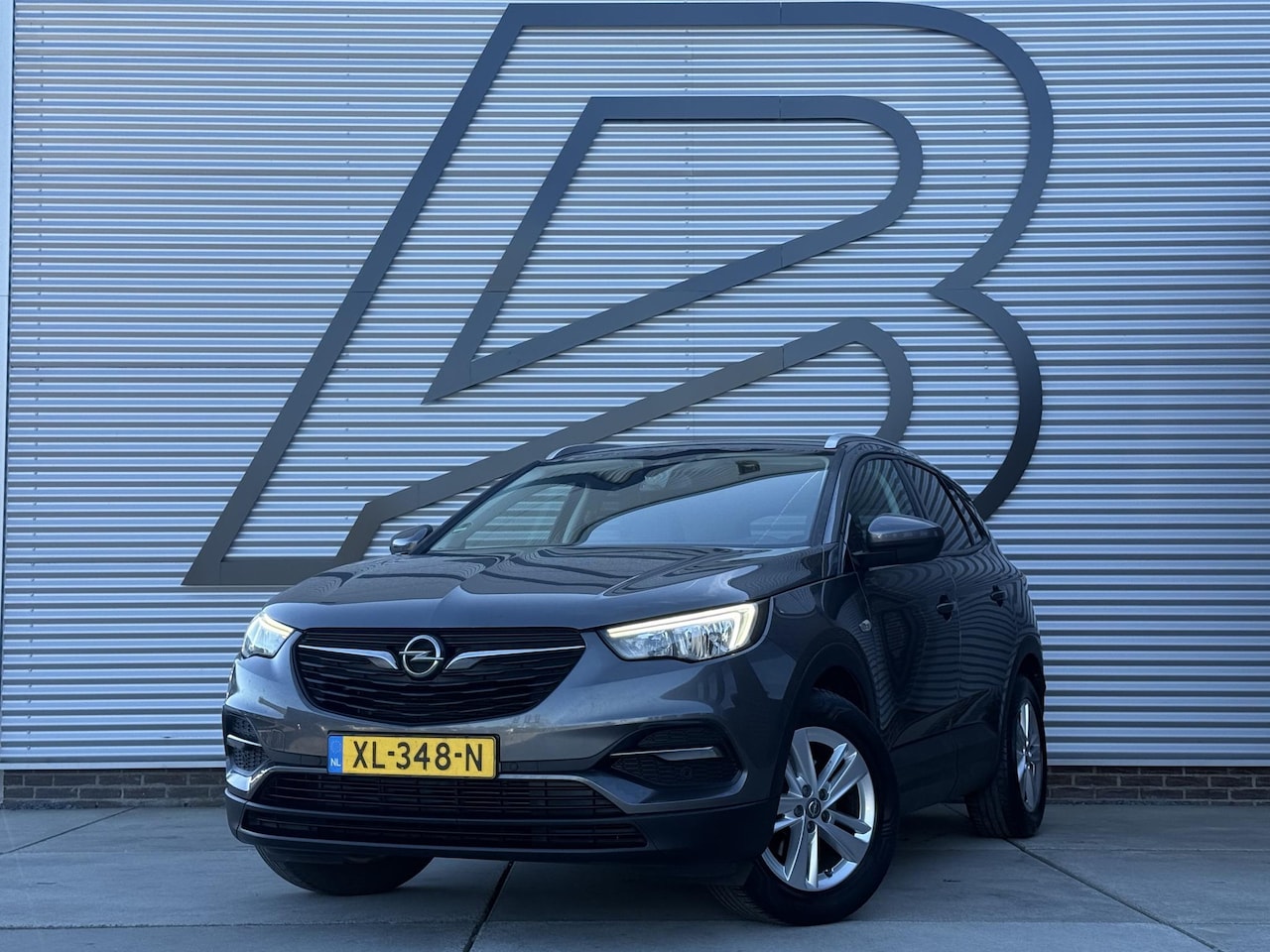 Opel Grandland X - 1.2 Turbo Business + 2e Eigenaar|Navi|Camera|Trekhaak|D-riem v.v. in 2025|Clima|Cruise|Car - AutoWereld.nl