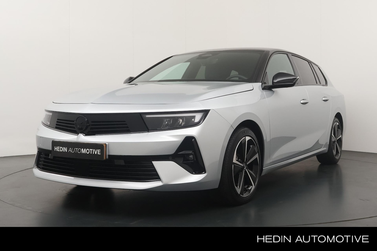 Opel Astra Sports Tourer - 1.2 145pk Hybrid GS | Navigatie | Adaptive Cruise Control | Stuur/Stoelverwarming | Camera - AutoWereld.nl