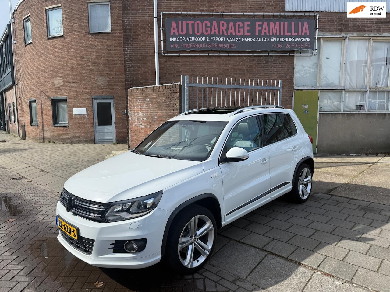 Volkswagen Tiguan - 2.0 TSI Sport&Style 4Motion - AutoWereld.nl