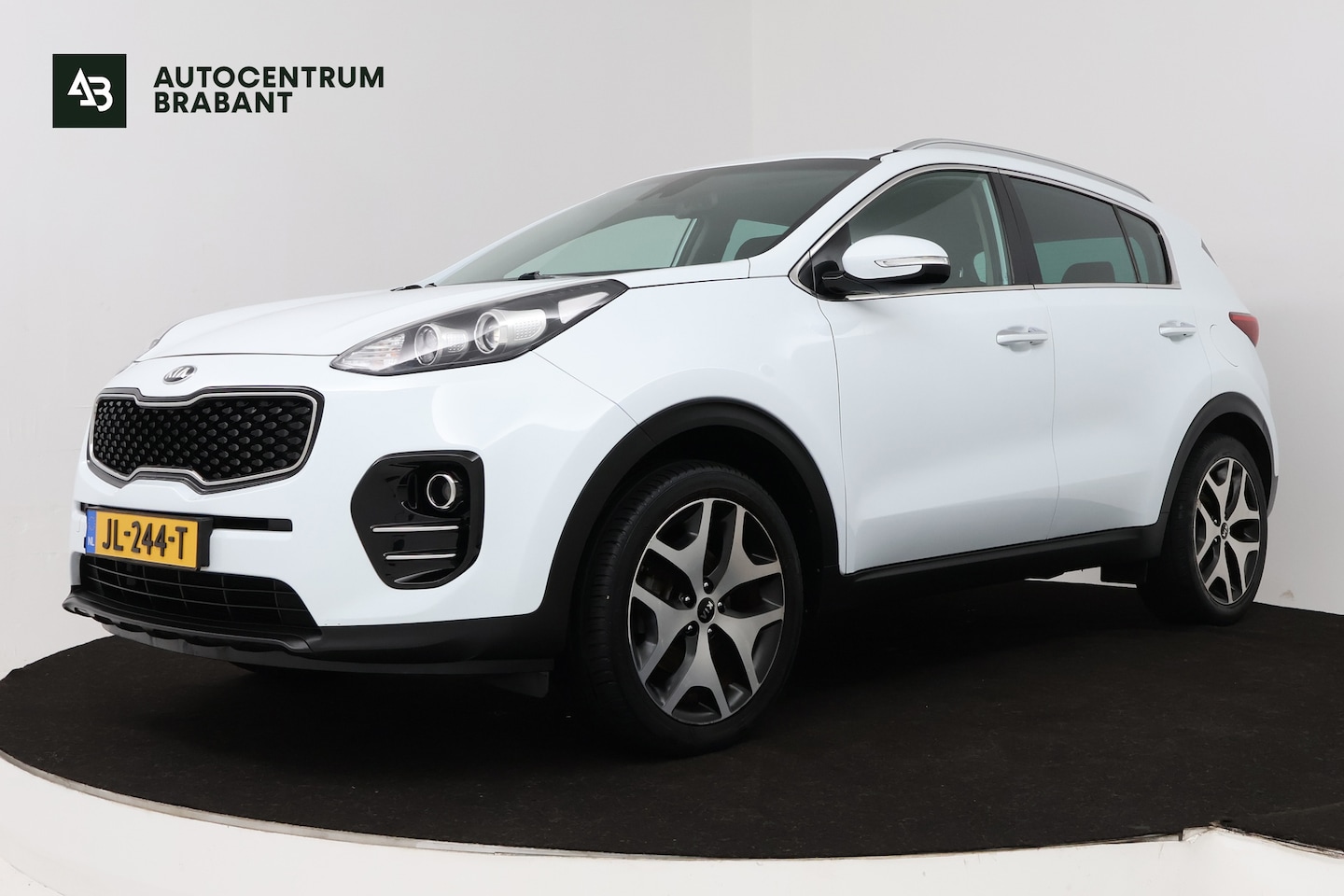 Kia Sportage - 1.6 GDI First Edition (ACHTERUITRIJCAMERA, CRUISE CONTROL, NAVIGATIE, PARKEERSENSOREN) - AutoWereld.nl