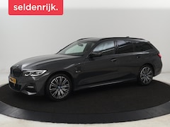 BMW 3-serie Touring - 320e M Sport | Leder | Adaptive cruise | Stoelverwarming | Camera | Keyless | Carplay | Sp
