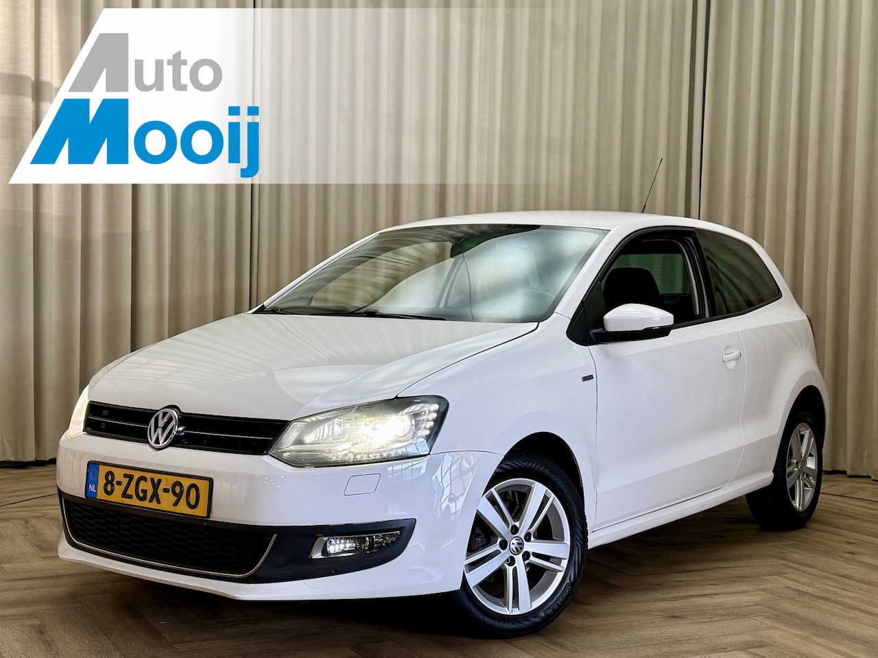 Volkswagen Polo - 1.2-12V Xenon / Stoelverwarming / Cruise Control / ECC Clima / PDC / 15'' LMV - AutoWereld.nl