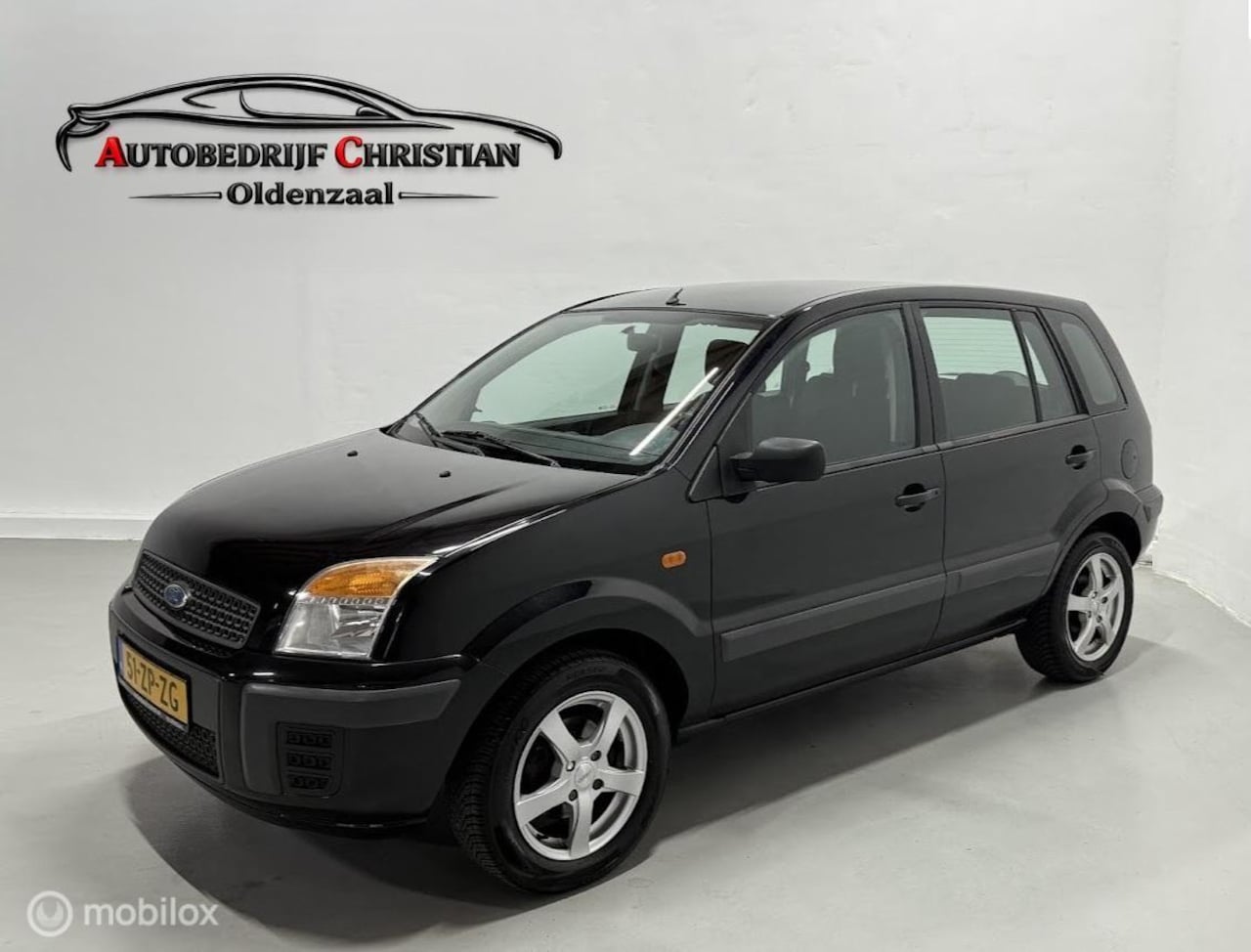 Ford Fusion - 1.4-16V Cool & Sound | AIRCO | TREKHAAK - AutoWereld.nl