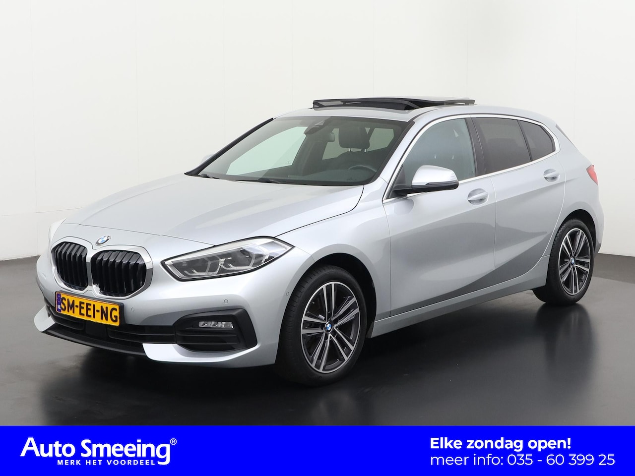 BMW 1-serie - 118i Business Design | Panoramadak | Leder | Camera | Zondag Open! - AutoWereld.nl