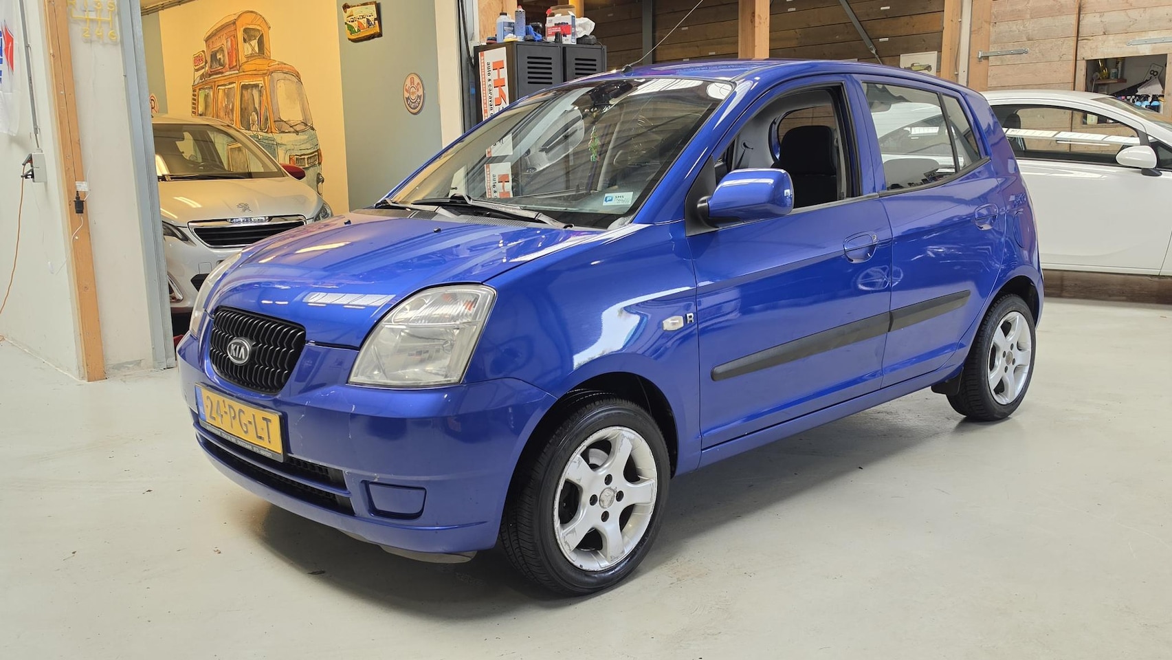 Kia Picanto - 1.1 LX Sportvelgen, inruilkoopje... - AutoWereld.nl