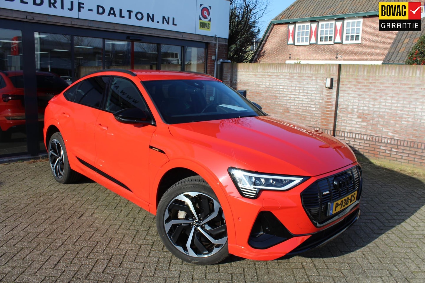 Audi e-tron Sportback - 55 quattro S 95 kWh SOH 94,3 % ORANGE MET - AutoWereld.nl