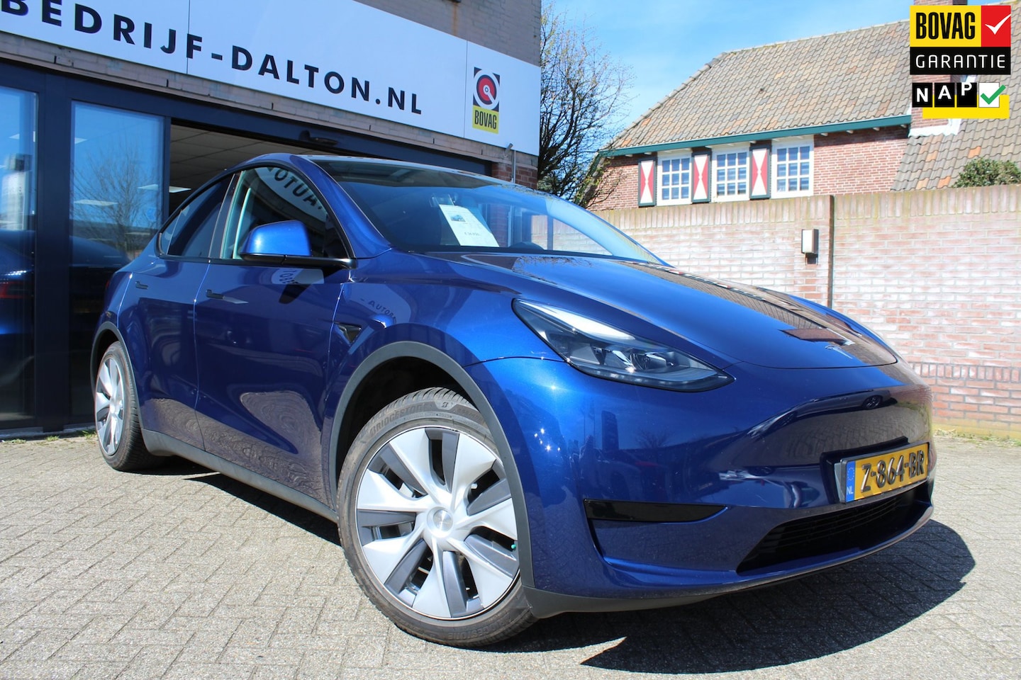 Tesla Model Y - Std RANGE 1e EIG. / LAGE KM / PANODAK / LEER / INCL. BTW - AutoWereld.nl