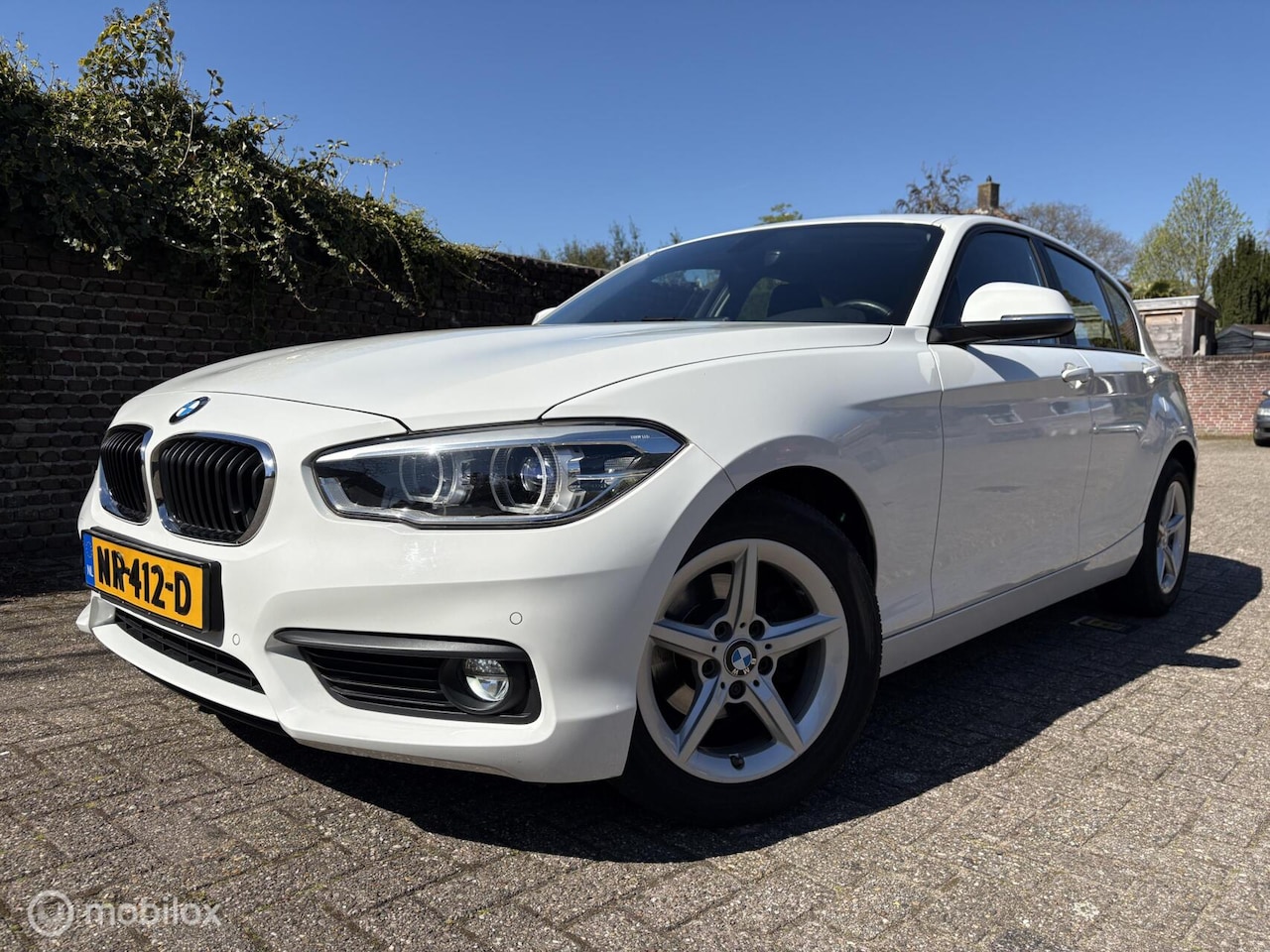 BMW 1-serie - 116i Executive / Climate control / Navigatie - AutoWereld.nl