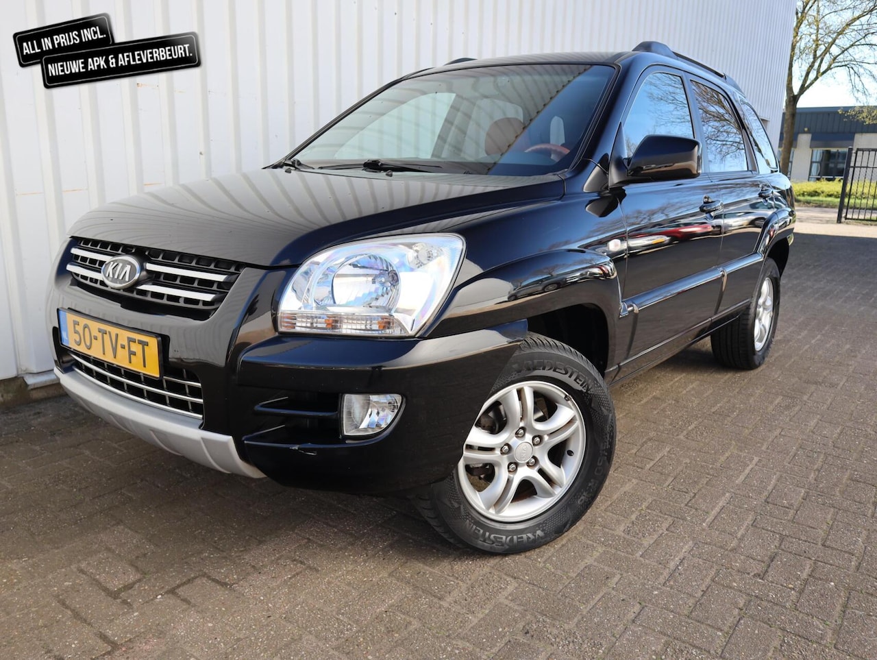 Kia Sportage - 2.0 CVVT Executive 9Vol opties) Airco PDC Leer - AutoWereld.nl