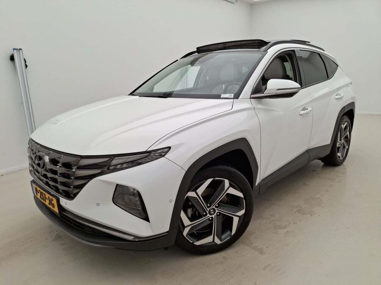 Hyundai Tucson - 1.6 T-GDI 180PK PHEV Premium Sky/Trekhaak/Pano/Leer/Led - AutoWereld.nl